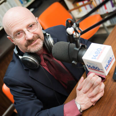 John at the mic 0b7ffd21336462dee81cec6f372e714b7379a66d1c7404dbe2cdd0d1acf12f86